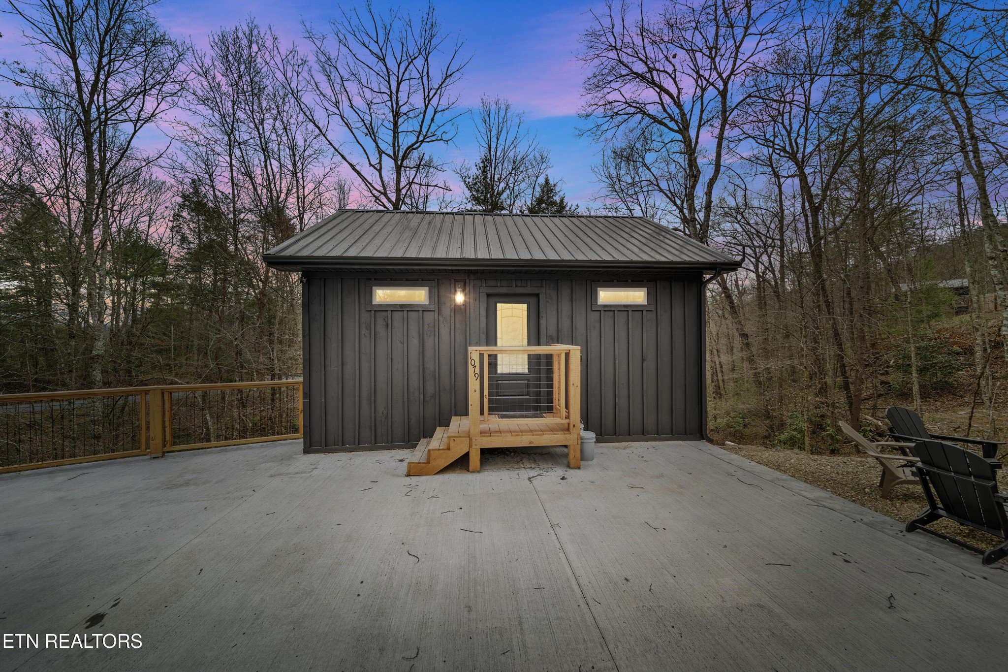 1079 Shell Mountain Road Sevierville, TN 37876 - Photo 23 of 29 a front view of a house with garden