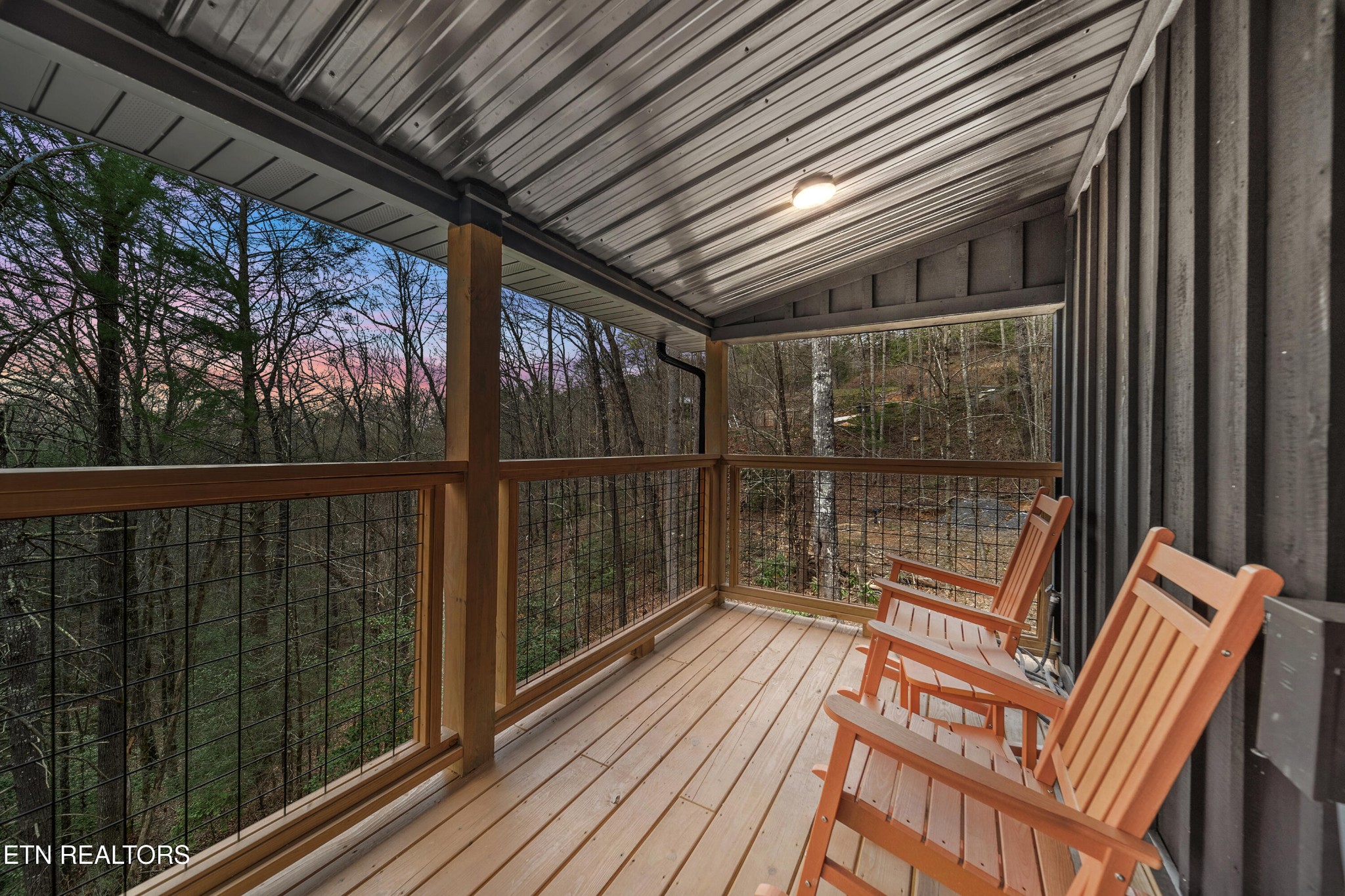 1079 Shell Mountain Road Sevierville, TN 37876 - Photo 5 of 29 a view of deck with furniture and wooden floor