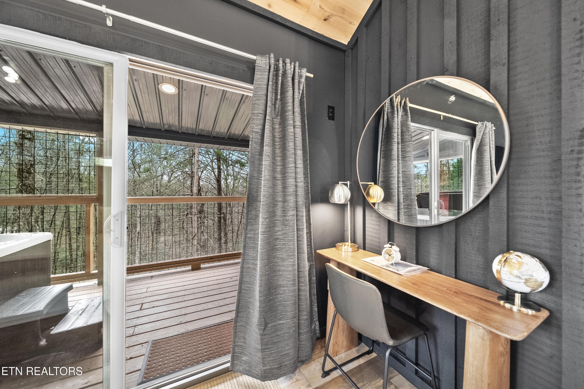 1079 Shell Mountain Road Sevierville, TN 37876 - Photo 9 of 29 a bathroom with a toilet a sink and mirror
