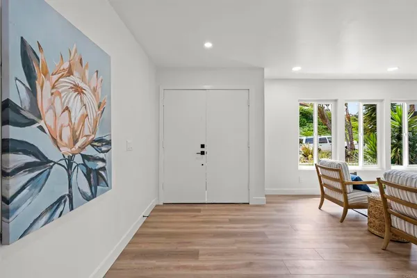 a view of a livingroom with furniture and deck