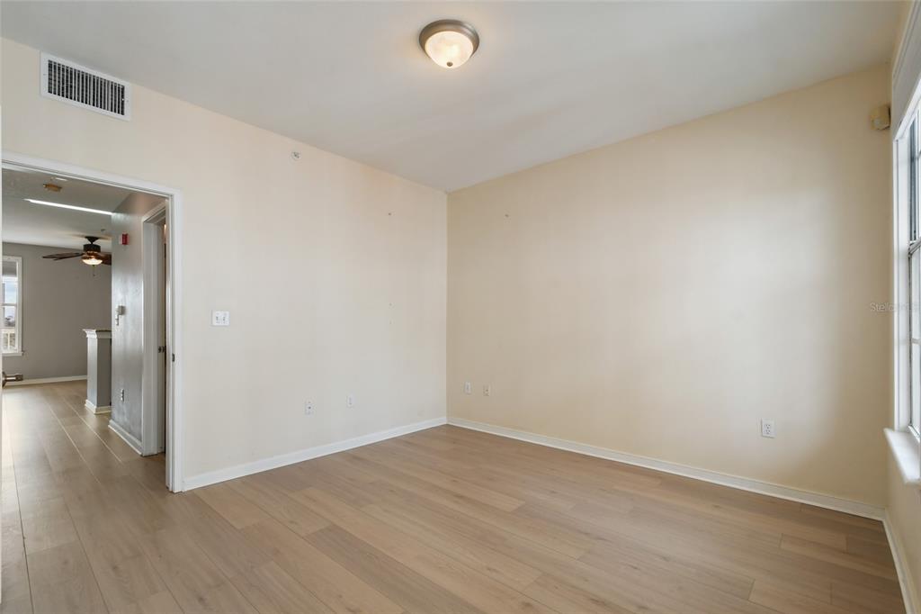600 Market Street, Unit 340 Celebration, FL 34747 - Photo 19 of 35 wooden floor in an empty room