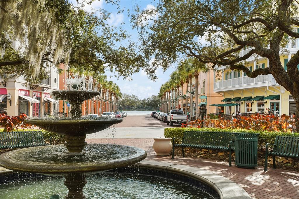 600 Market Street, Unit 340 Celebration, FL 34747 - Photo 30 of 35 a view of a fountain with potted plants