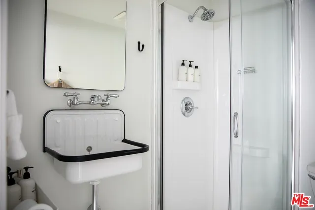 a view of backyard with swimming pool