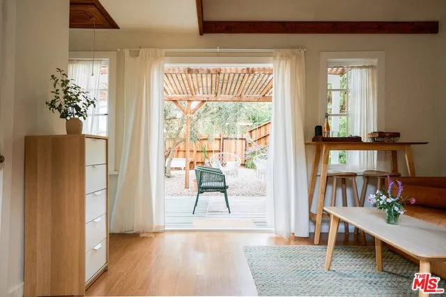 a view of a patio in the backyard