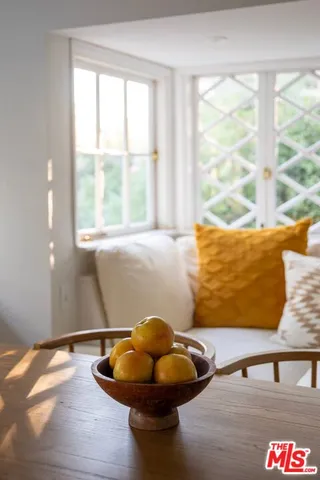a bathroom with a sink and wooden floor
