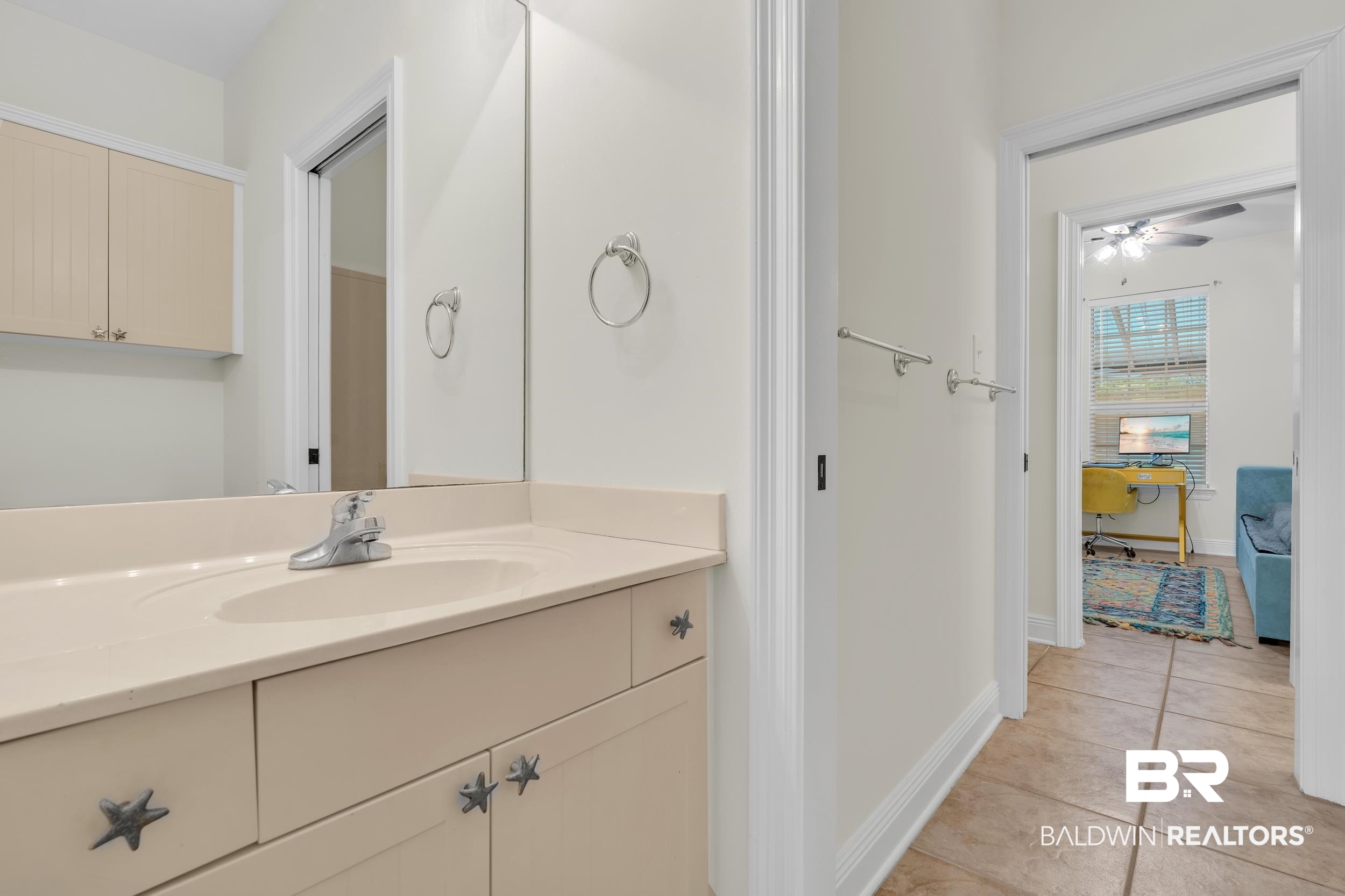 4606 Osprey Drive Orange Beach, AL 36561 - Photo 37 of 44 Jack and Jill bathroom with 2 private water closets and vanities.