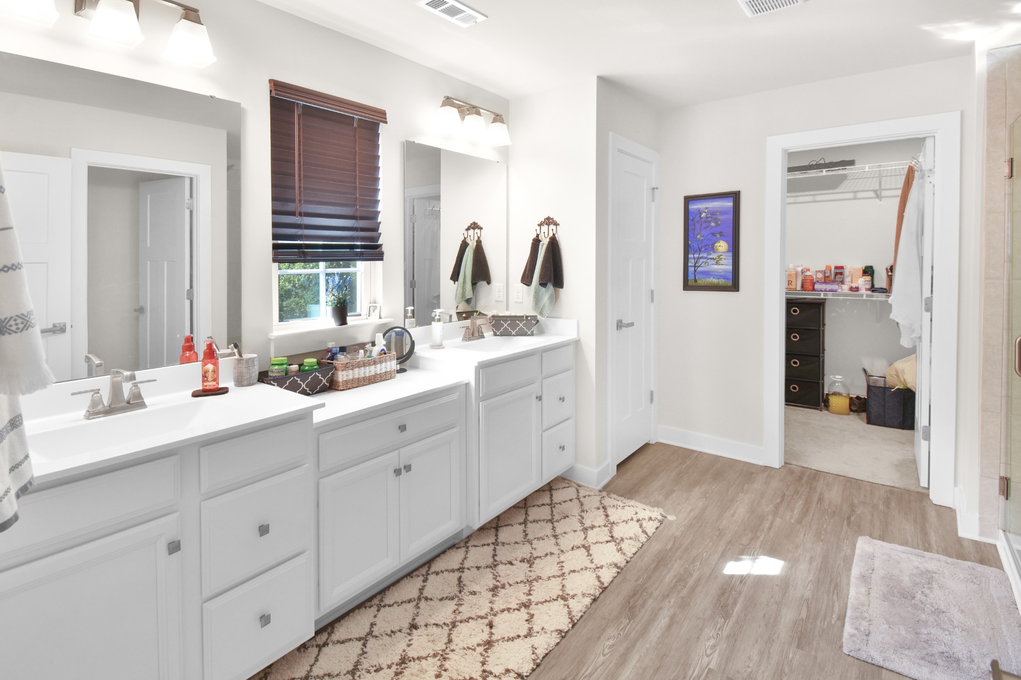 1094 Watermark Way Mount Juliet, TN 37122 - Photo 15 of 29 a spacious bathroom with a double vanity sink and mirror