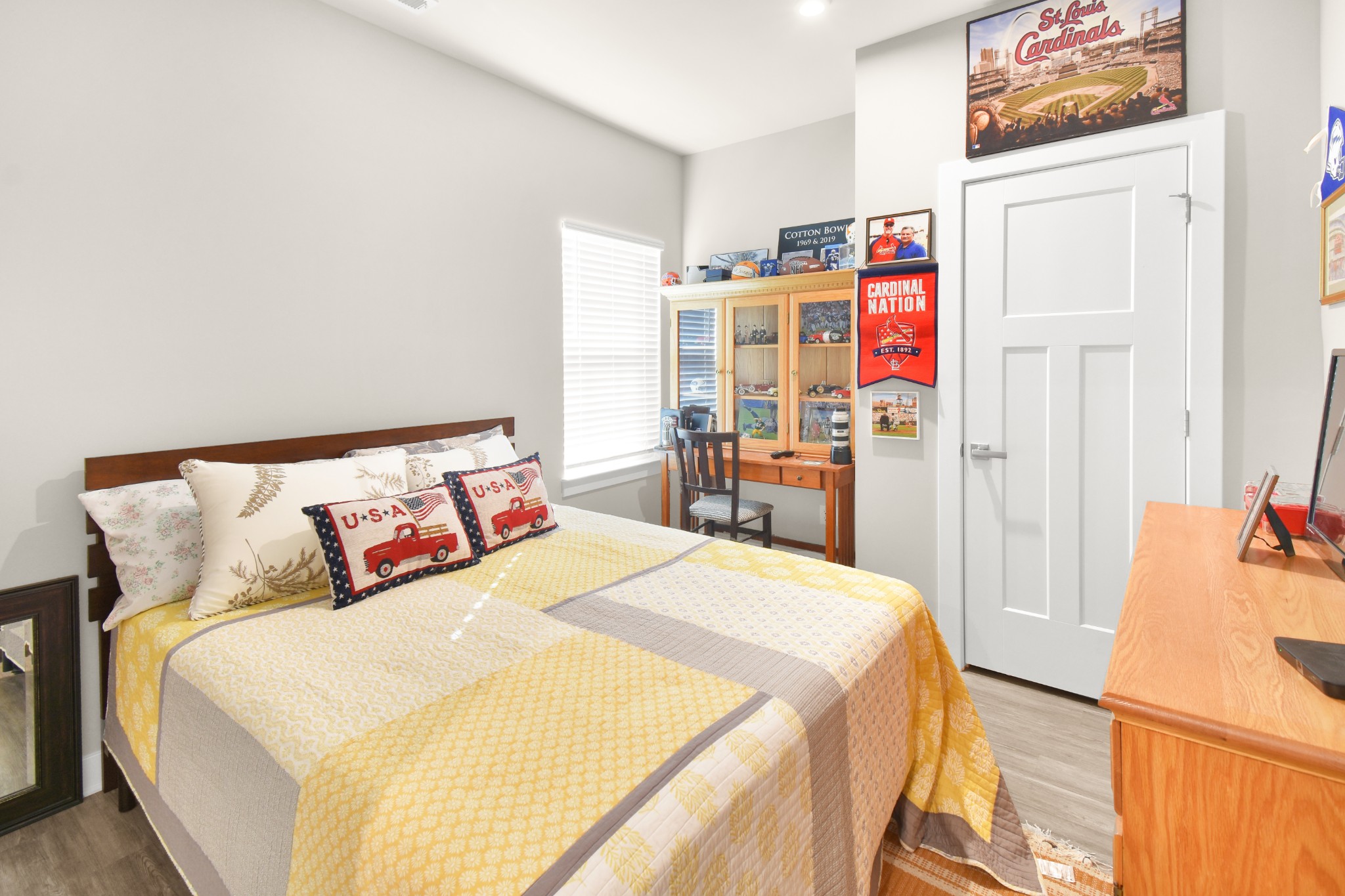 1094 Watermark Way Mount Juliet, TN 37122 - Photo 18 of 29 a bedroom with bed and wooden floor