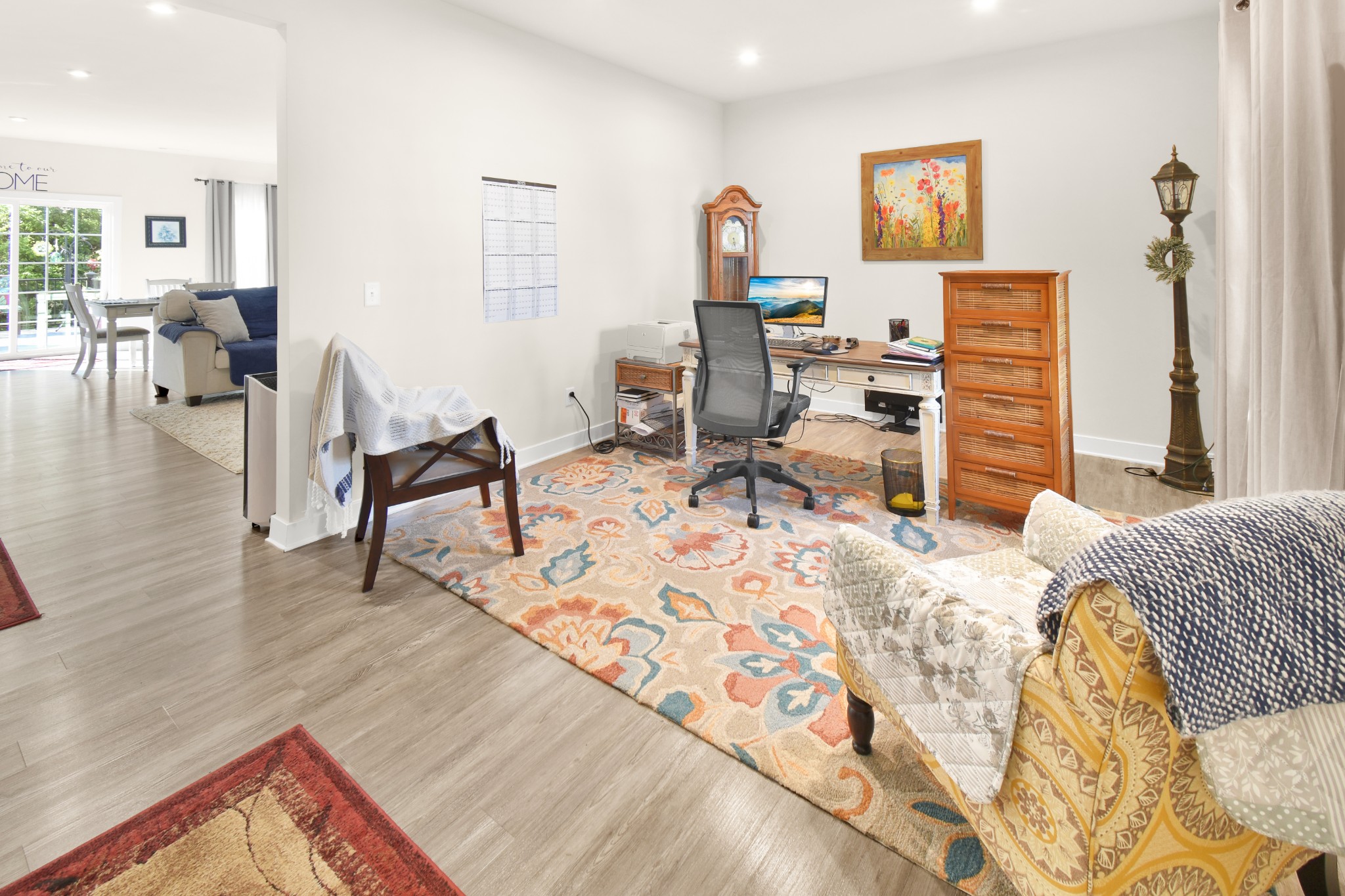 1094 Watermark Way Mount Juliet, TN 37122 - Photo 23 of 29 a living room with furniture and a wooden floor