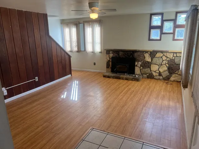 a view of a livingroom with wooden floor