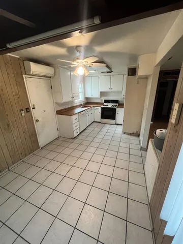 a view of a refrigerator and window