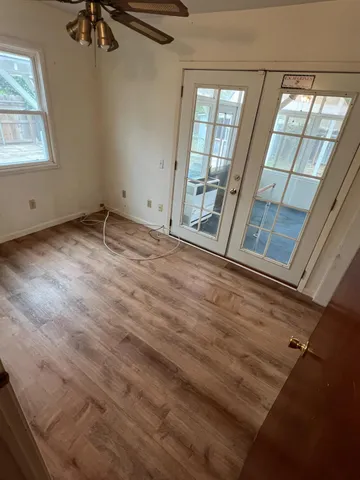 an empty room with windows