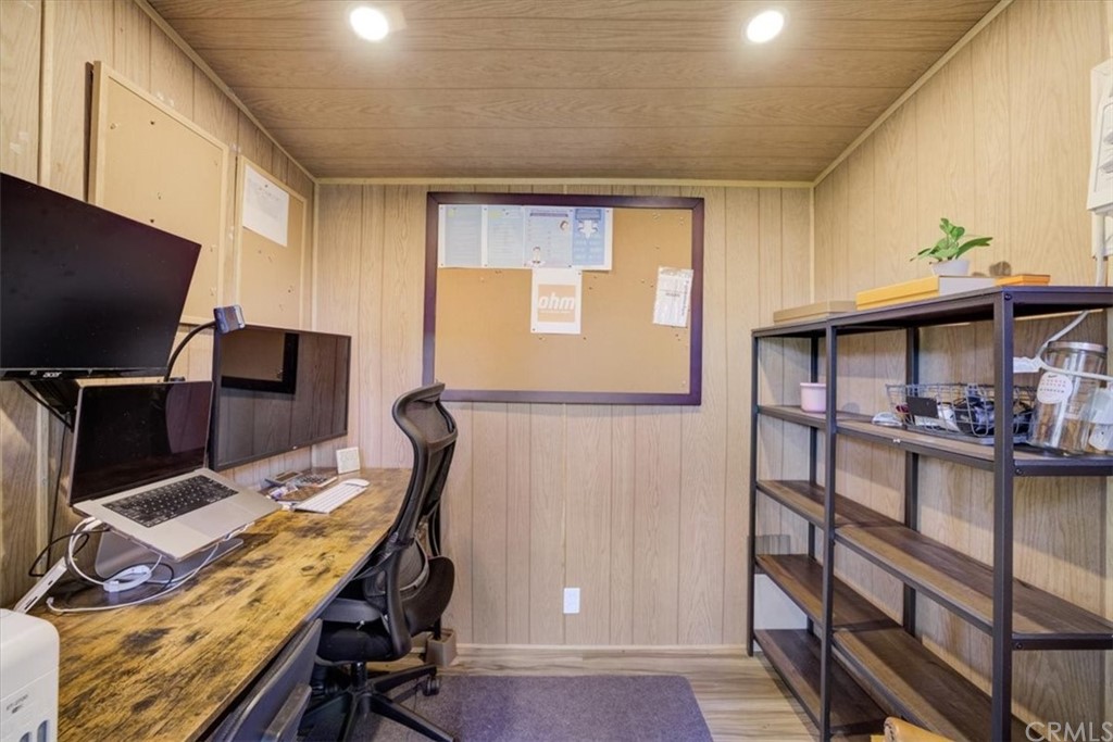 1030 Sinaloa Avenue Pasadena, CA 91104 - Photo 32 of 45 a view of a workspace with furniture and a window