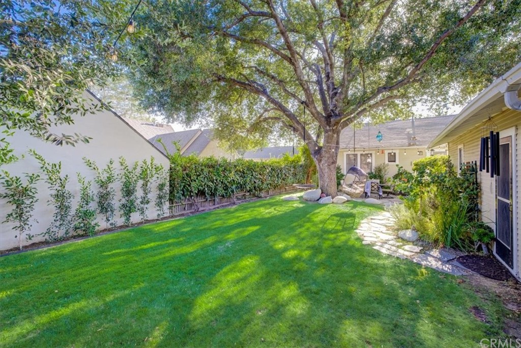 1030 Sinaloa Avenue Pasadena, CA 91104 - Photo 39 of 45 a view of a yard with plants and large trees