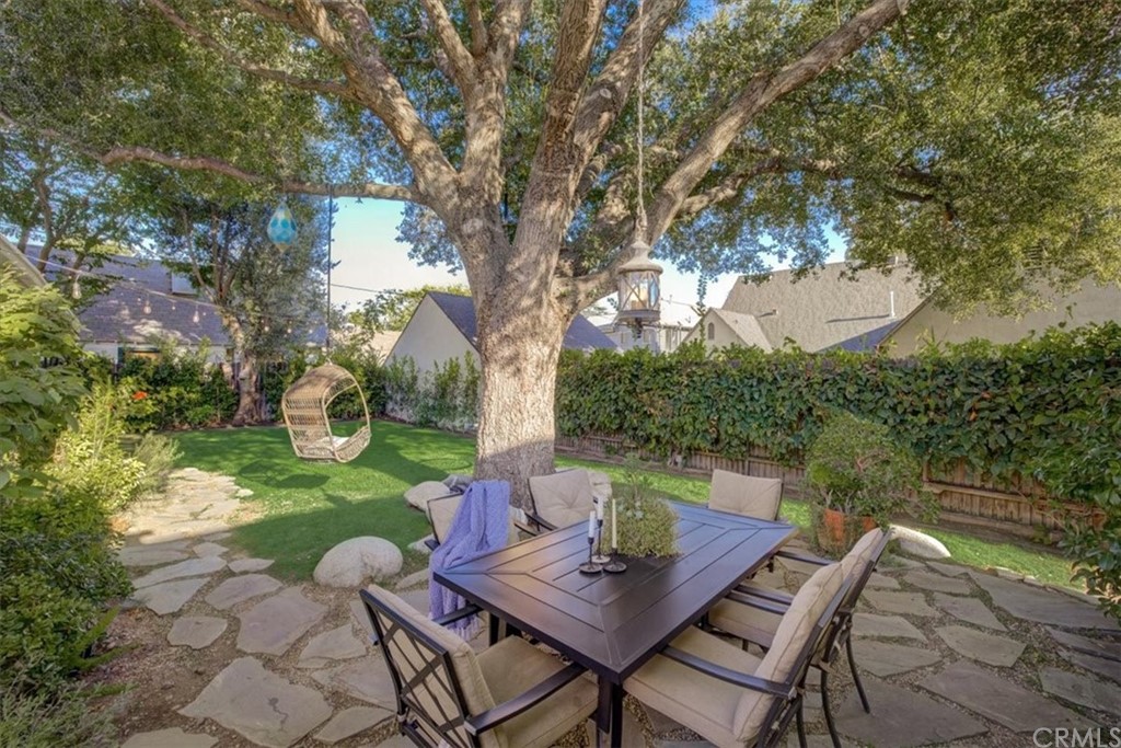 1030 Sinaloa Avenue Pasadena, CA 91104 - Photo 43 of 45 a view of a table and chairs in the garden