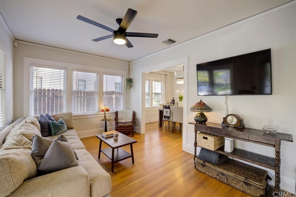 1030 Sinaloa Avenue Pasadena, CA 91104 - Photo 8 of 45 a living room with furniture and a flat screen tv