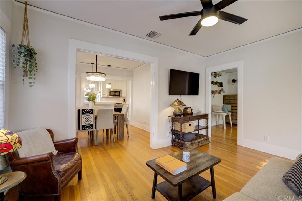 1030 Sinaloa Avenue Pasadena, CA 91104 - Photo 10 of 45 a living room with furniture and a flat screen tv