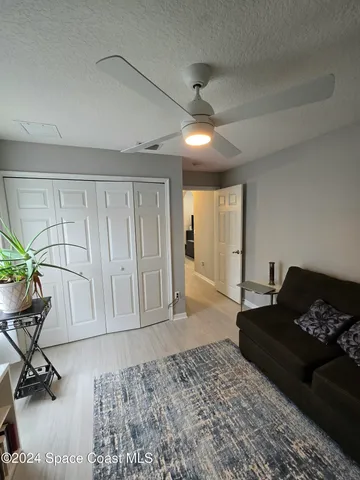 a bathroom with a sink toilet and mirror