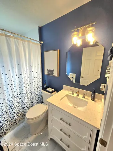 a view of a swimming pool with an outdoor space