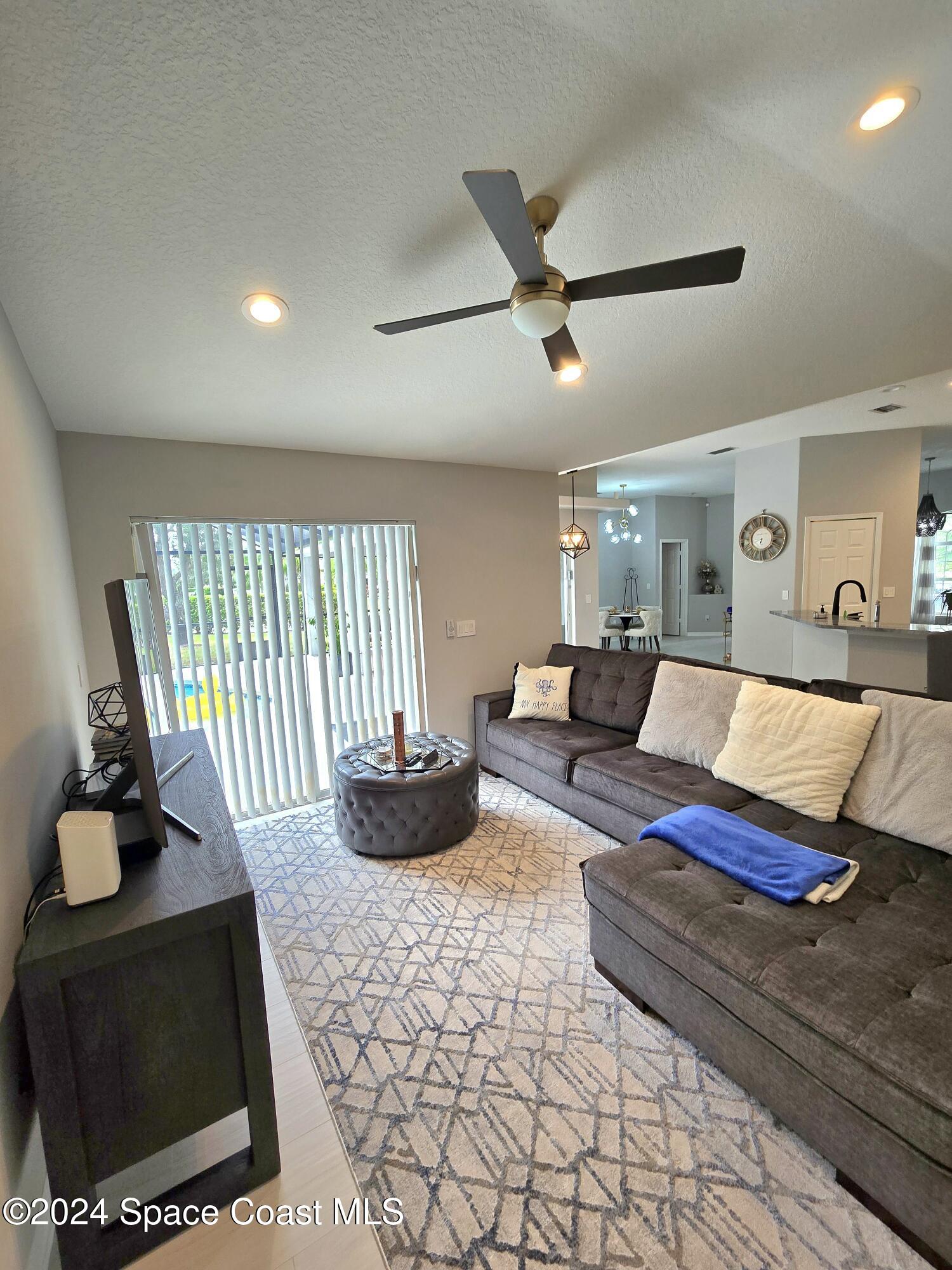 491 South Key Lime Square Southwest Vero Beach, FL 32968 - Photo 9 of 29 a living room with furniture