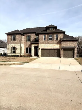 a view of a house with large windows