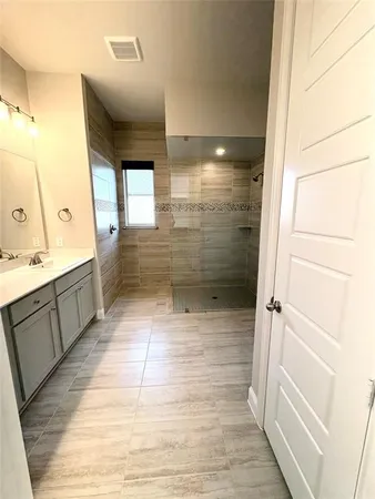a view of a hallway with bedroom