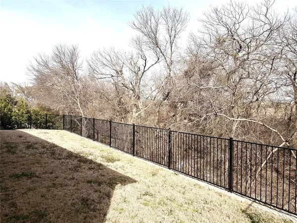 a view of a backyard of a house