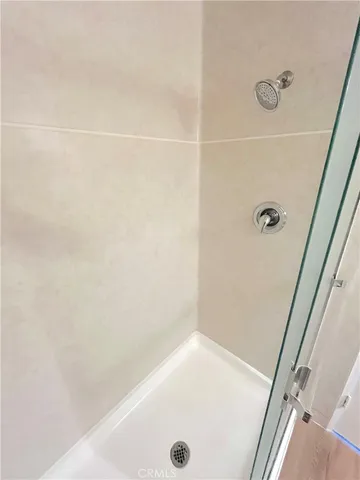 a view of a swimming pool with some plants