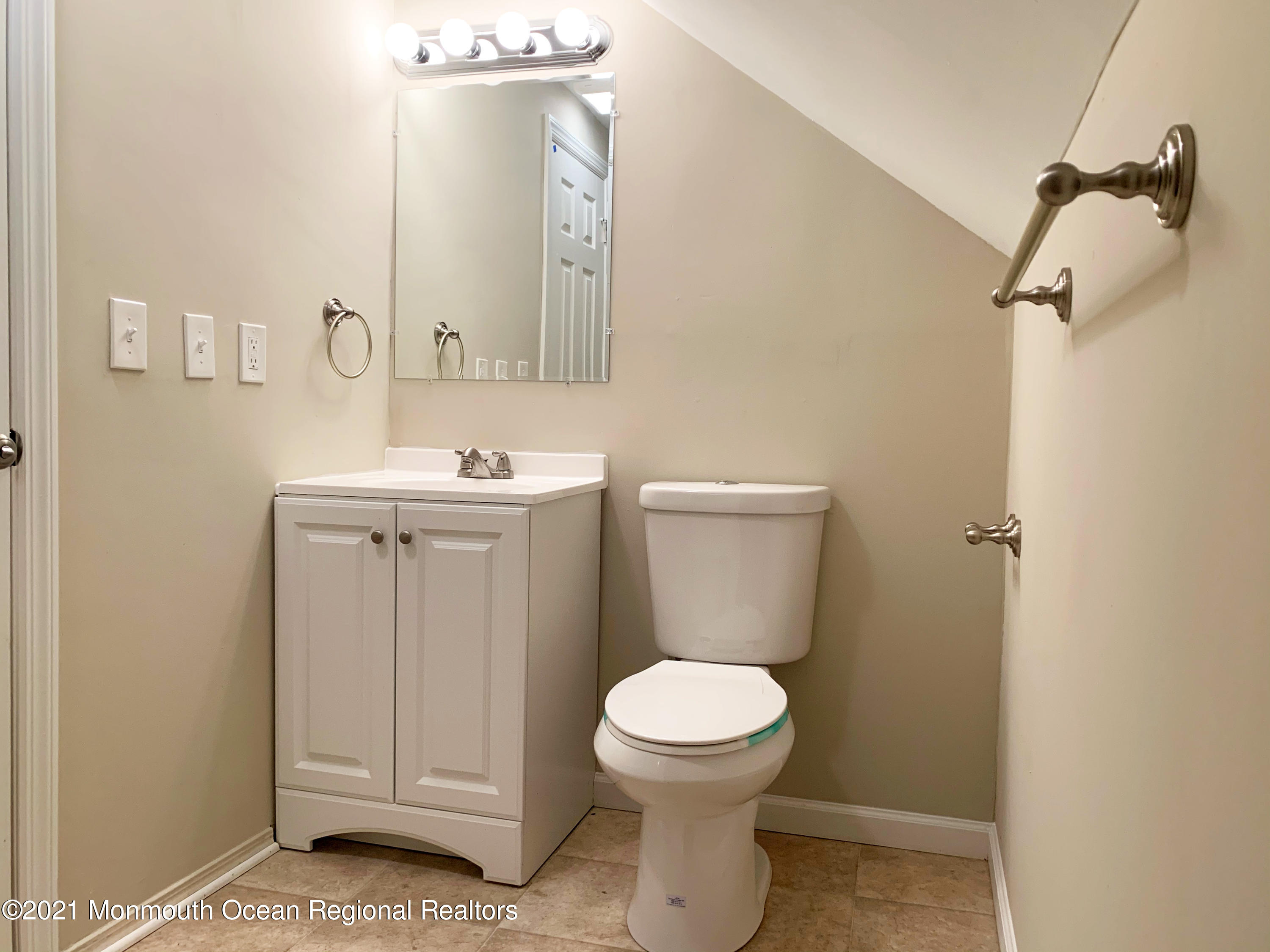 88 W Road Tuckerton, NJ 08087 - Photo 20 of 25 a bathroom with a sink a toilet and mirror