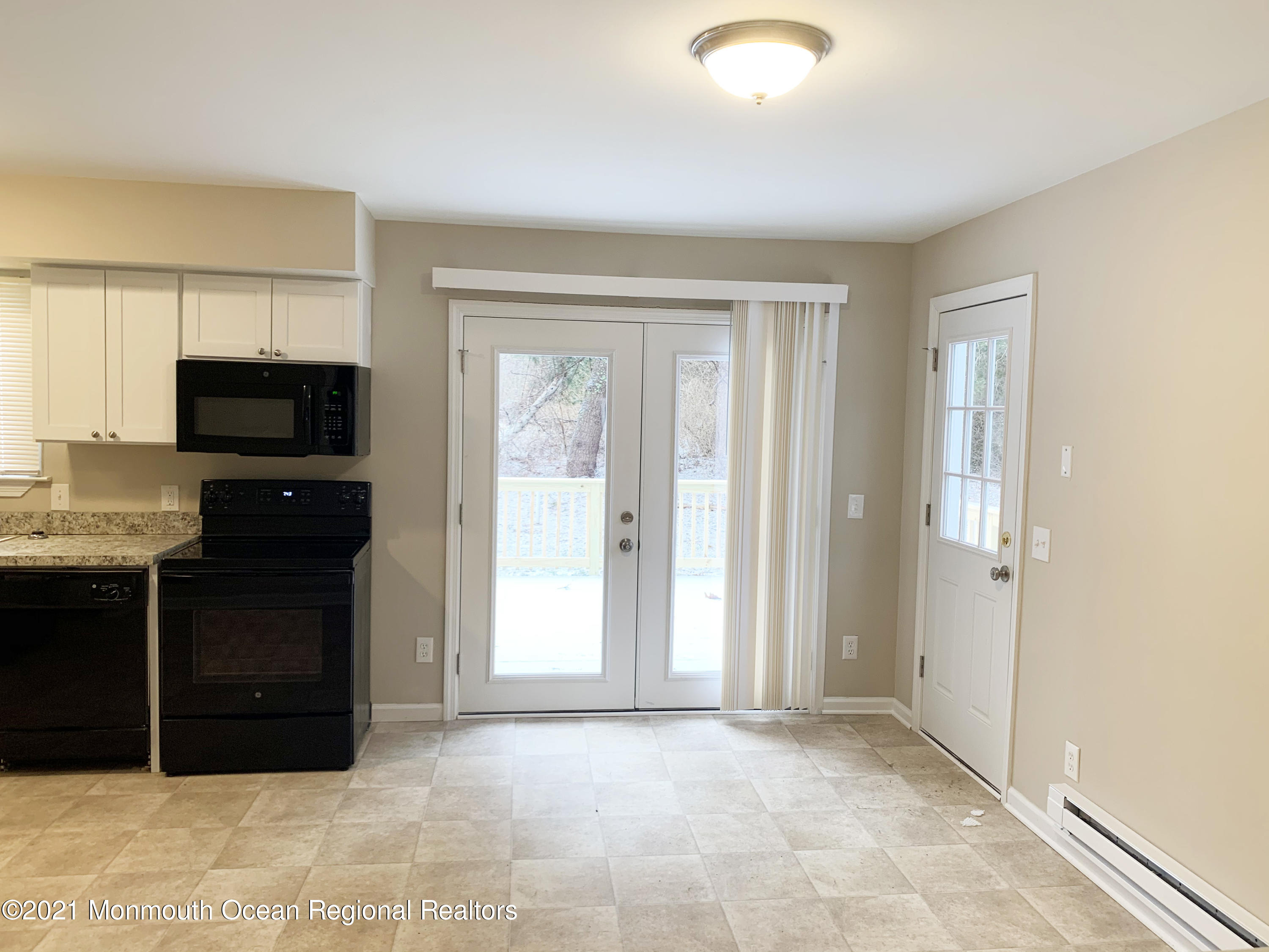 88 W Road Tuckerton, NJ 08087 - Photo 8 of 25 a view of kitchen with microwave cabinets and window