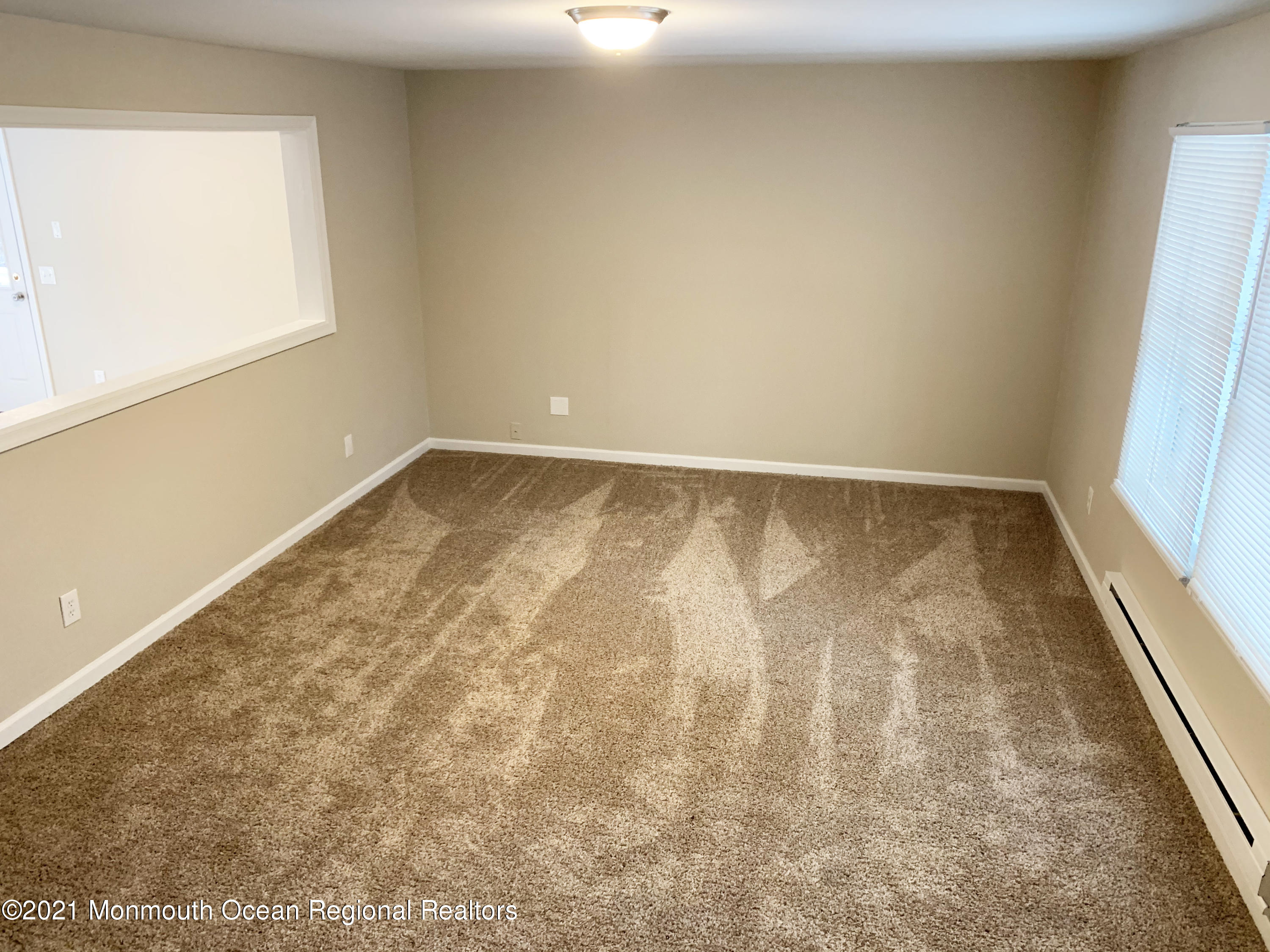 88 W Road Tuckerton, NJ 08087 - Photo 9 of 25 a view of an empty room and window