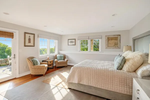 a bedroom with a beds and a couch