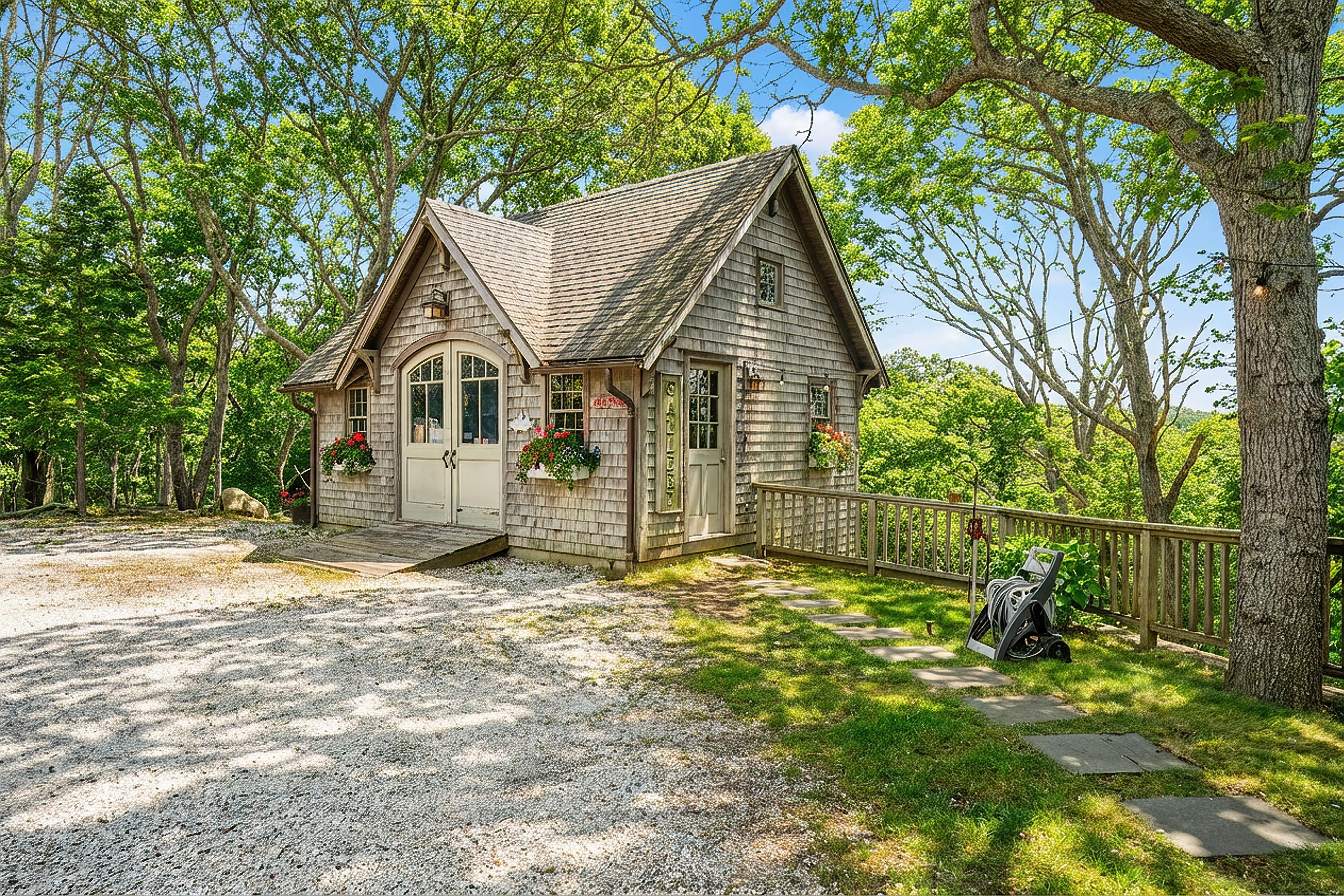 4 Nomans Watch Road Aquinnah, MA 02535 - Photo 27 of 36 a view of a house with a yard and large tree