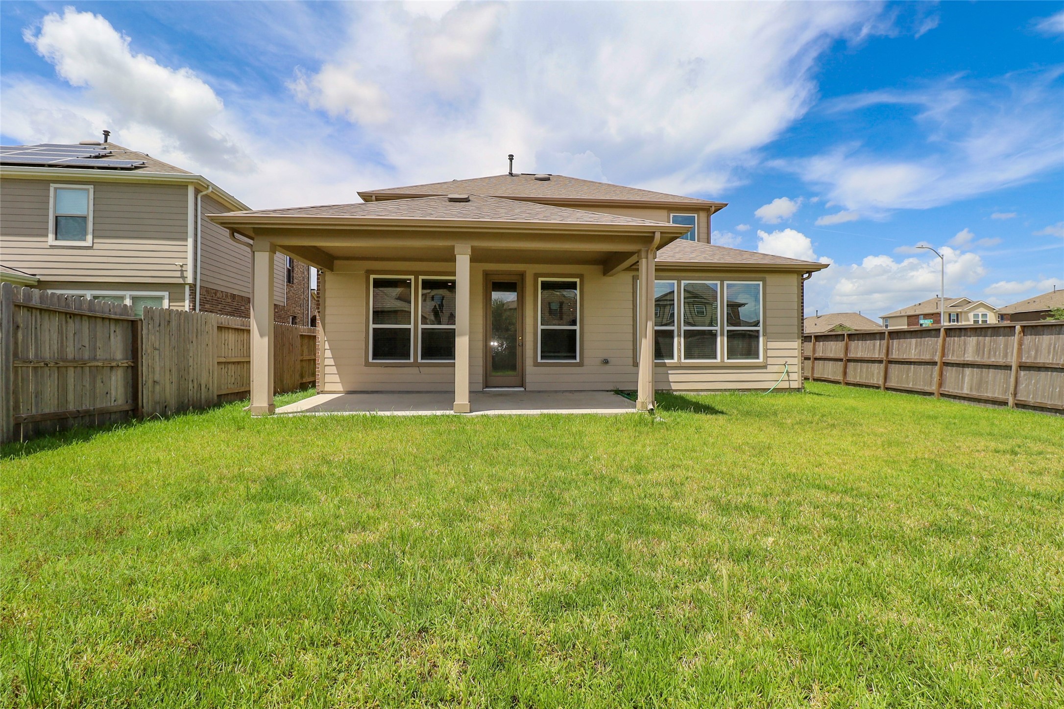 1418 Red Hills Drive Rosharon, TX 77583 - Photo 27 of 36 front view of a house with a garden