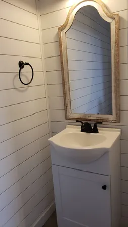 a bathroom with a sink and a shower
