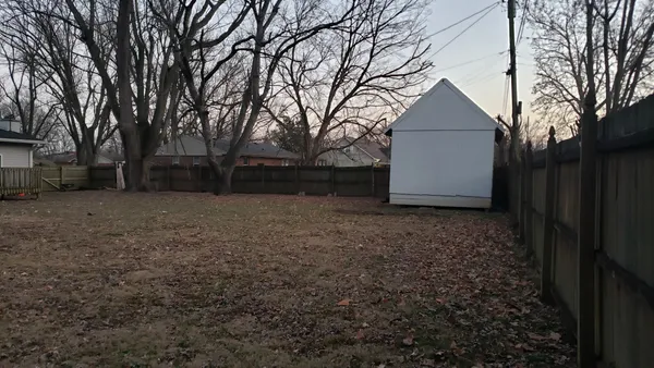 a view of backyard of house