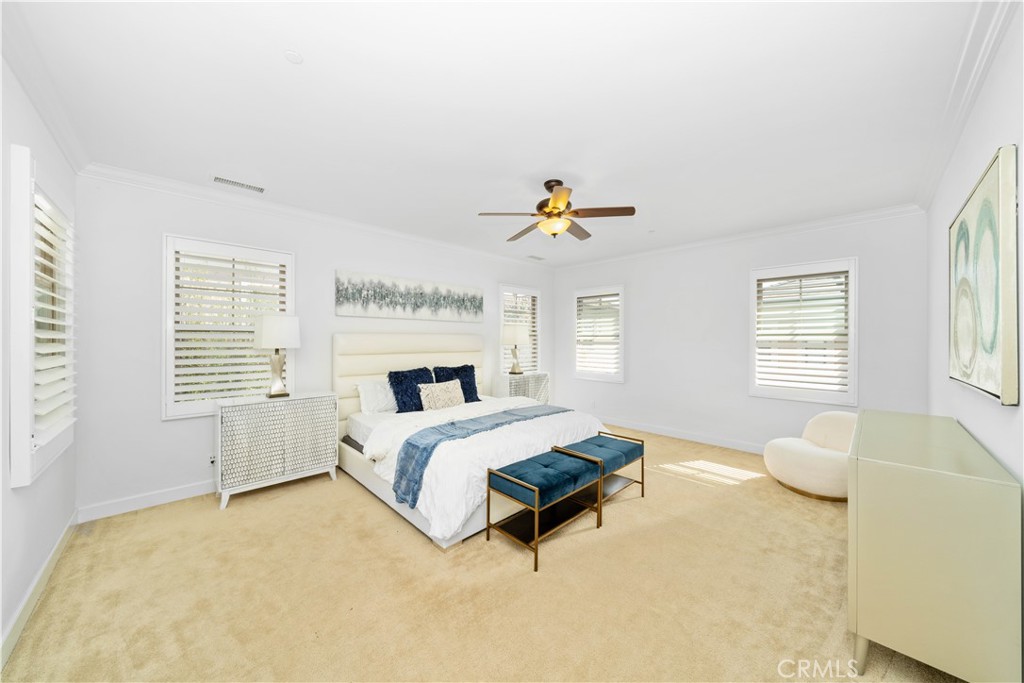 64 Hazelton Irvine, CA 92620 - Photo 11 of 20 a spacious bedroom with a bed and window