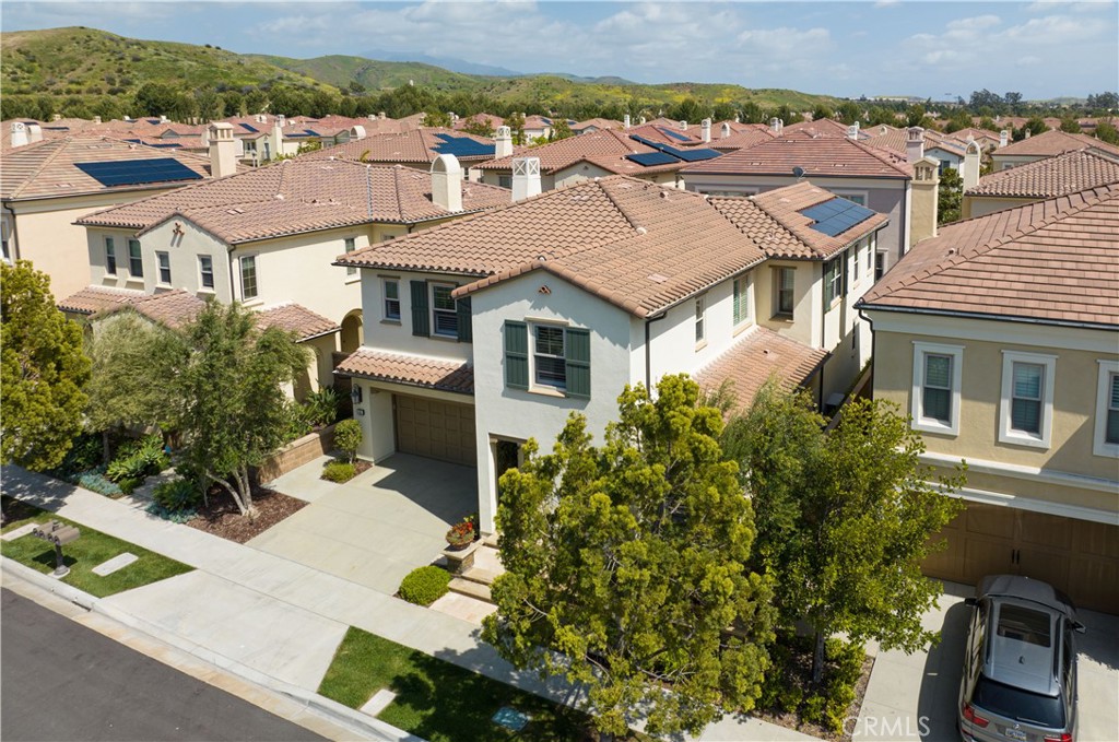 64 Hazelton Irvine, CA 92620 - Photo 19 of 20 an aerial view of a house with a yard