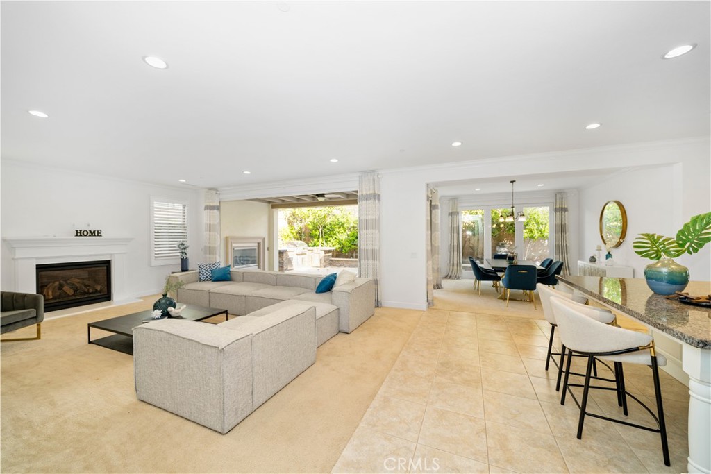 64 Hazelton Irvine, CA 92620 - Photo 6 of 20 a living room with furniture and a fireplace