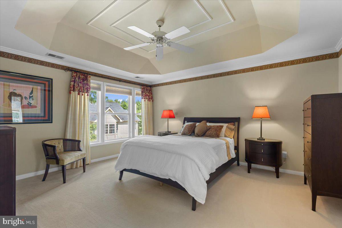 46134 Brisbane Square Sterling, VA 20165 - Photo 22 of 48 a bedroom with a bed desk and a chair