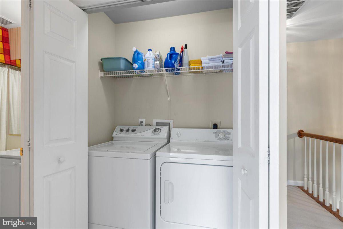 46134 Brisbane Square Sterling, VA 20165 - Photo 32 of 48 a utility room with dryer and washer