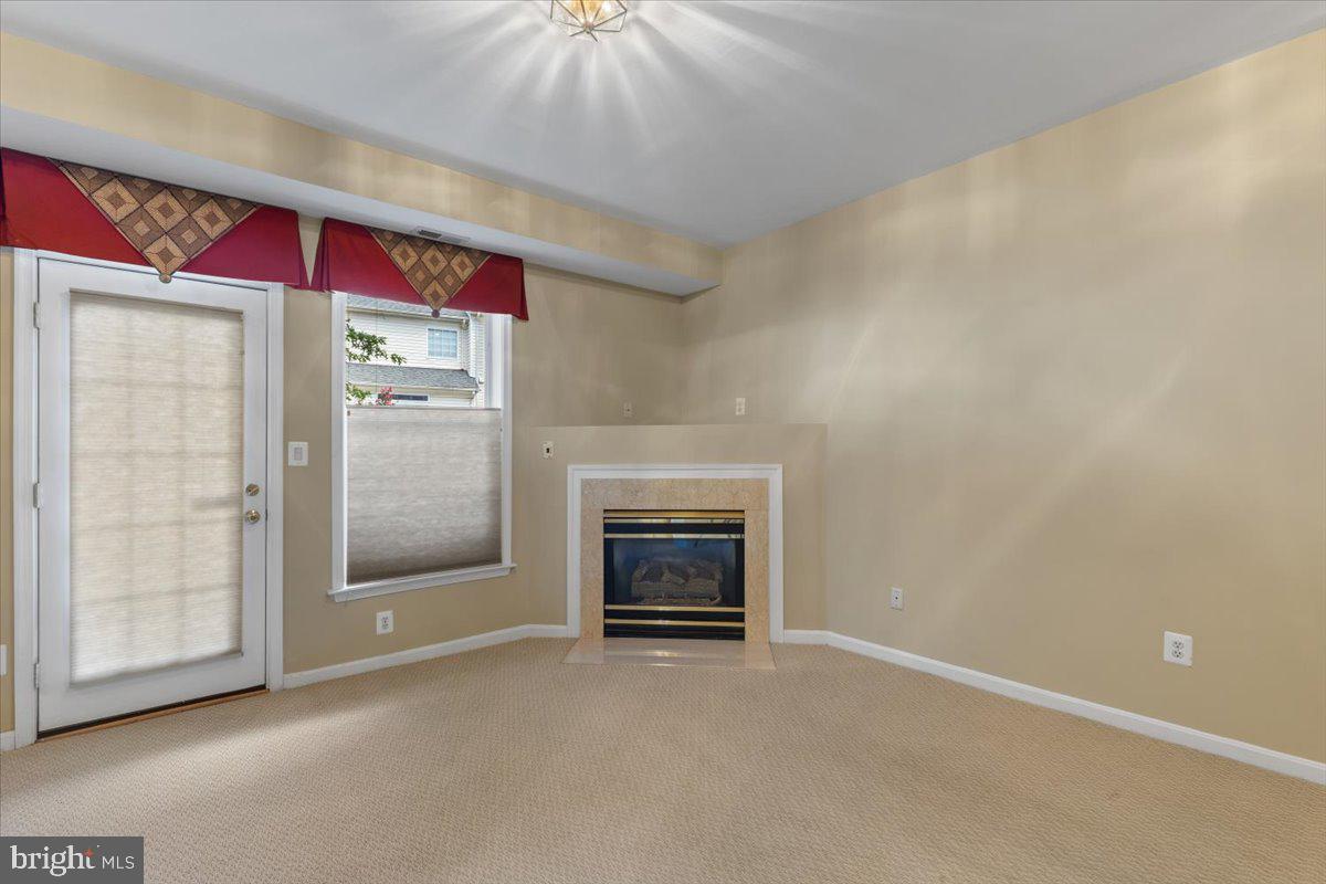 46134 Brisbane Square Sterling, VA 20165 - Photo 36 of 48 a view of empty room with fireplace