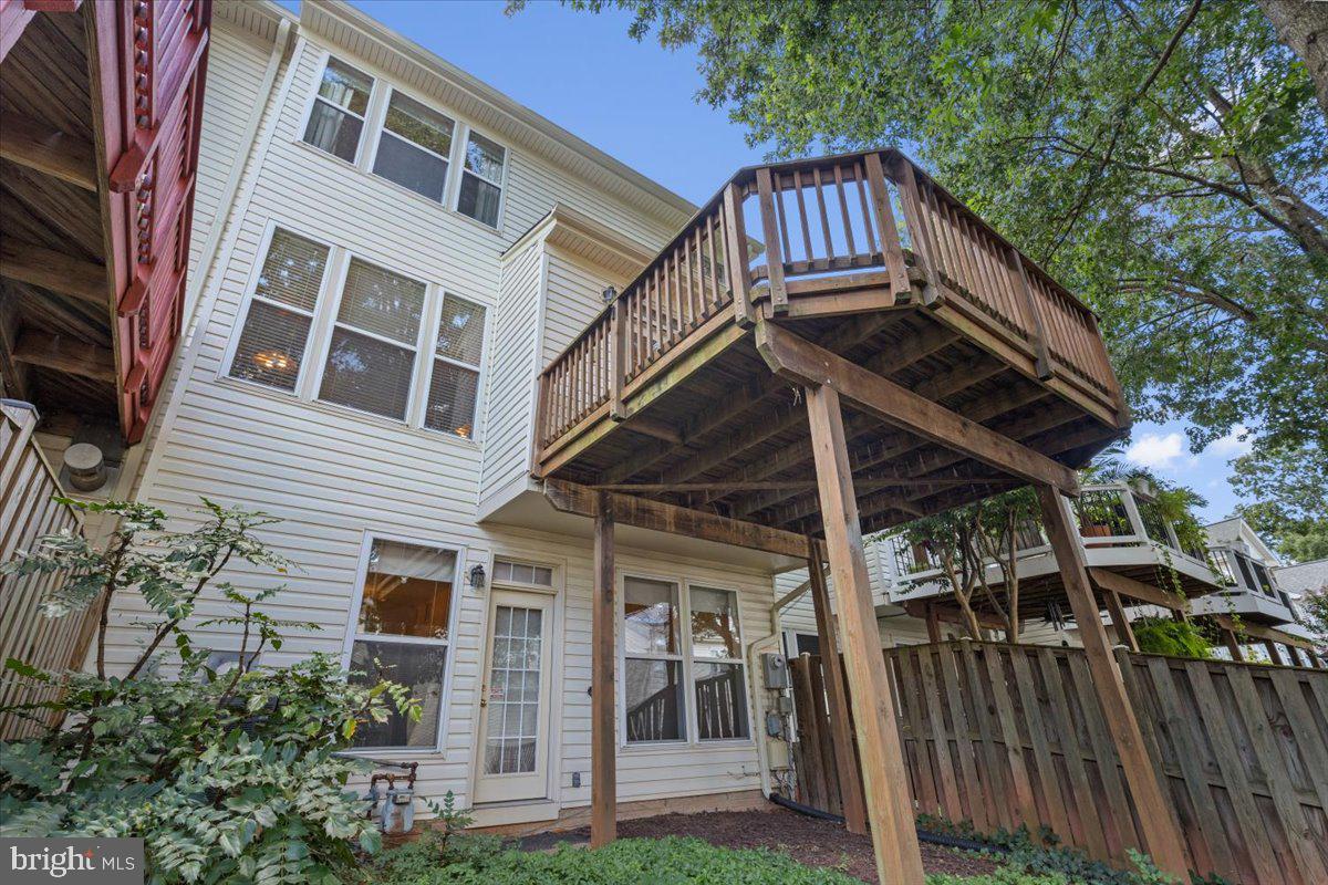 46134 Brisbane Square Sterling, VA 20165 - Photo 41 of 48 a view of a house with a yard