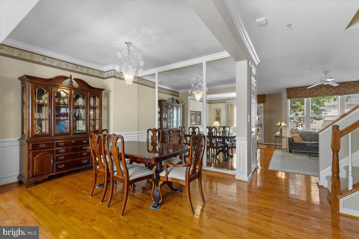 46134 Brisbane Square Sterling, VA 20165 - Photo 10 of 48 a view of a dining room with furniture and wooden floor