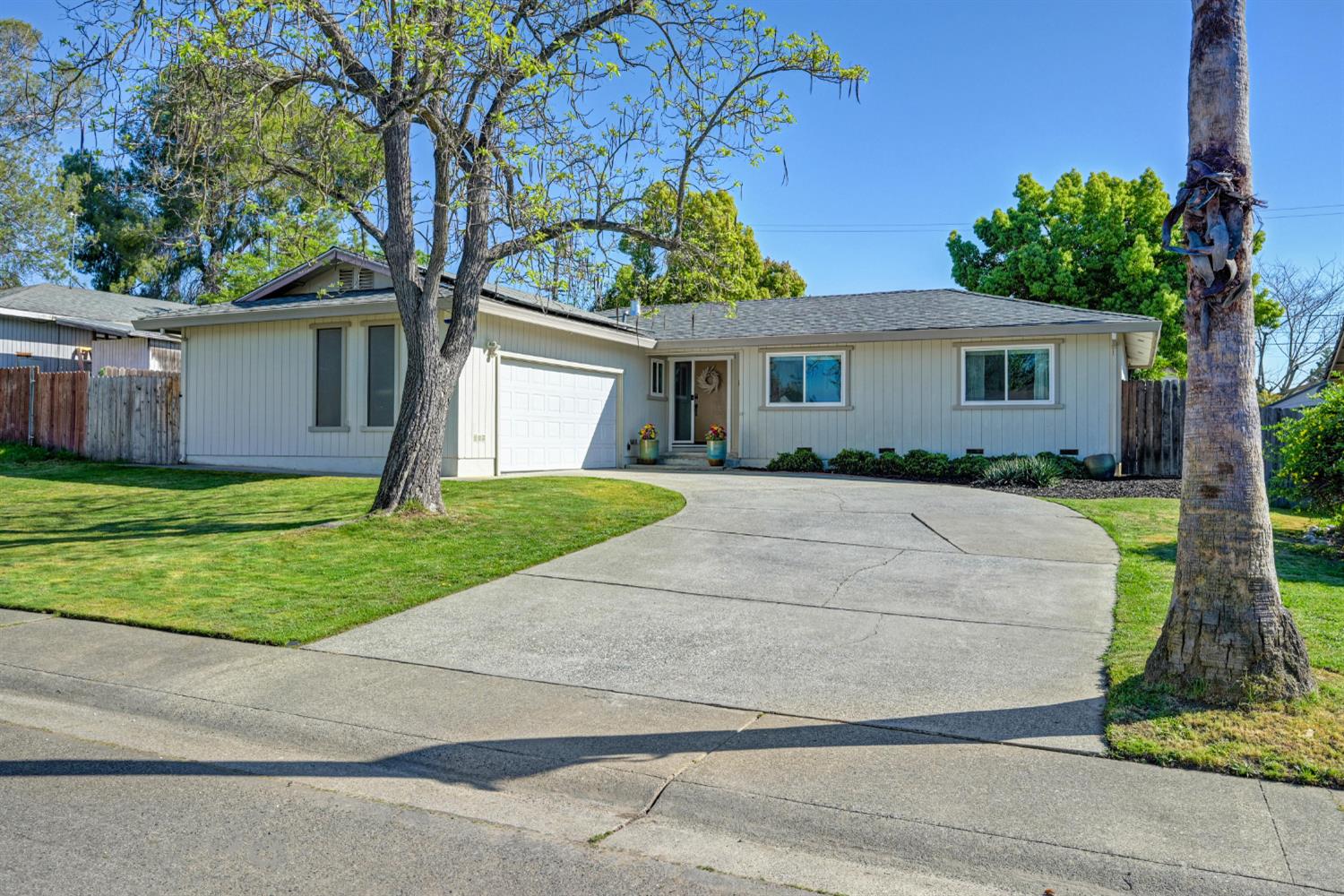 5750 Connie Court Loomis, CA 95650 - Photo 1 of 1 a view of house with a yard and large trees