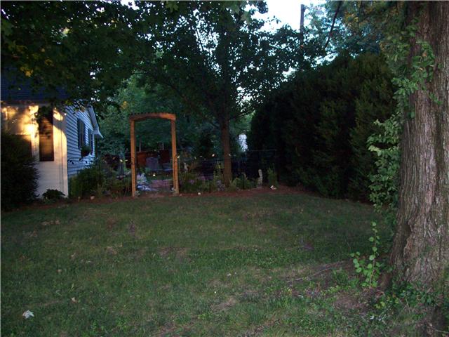320 Jackson Road Portland, TN 37148 - Photo 20 of 20 View of side of property with privacy hedges.