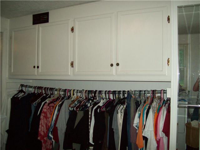 320 Jackson Road Portland, TN 37148 - Photo 7 of 20 Storage Cabinets and closet in laundry room.