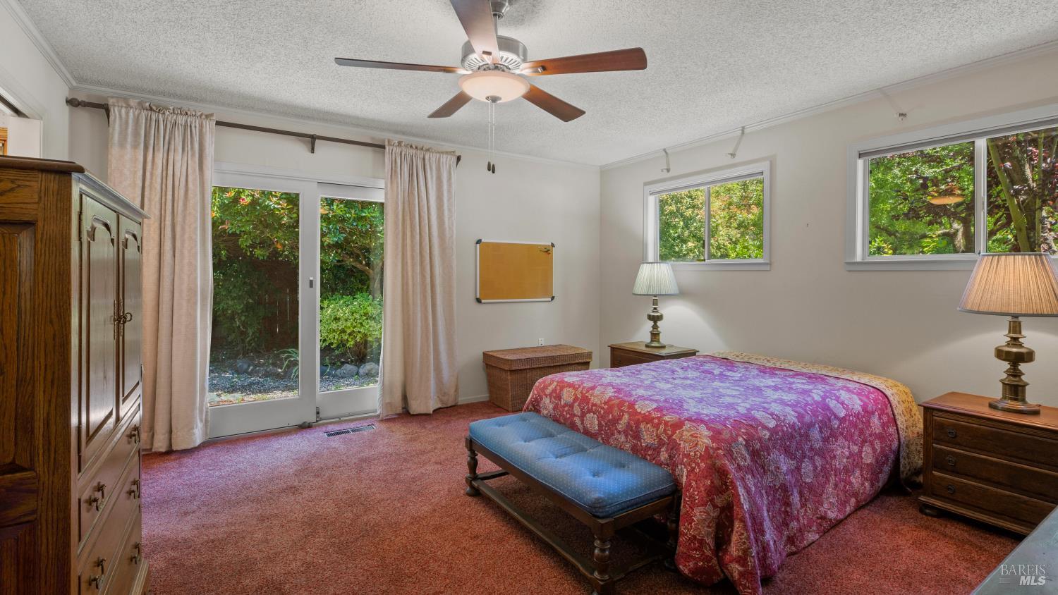 3609 Lurline Way Santa Rosa, CA 95405 - Photo 13 of 26 Primary bedroom with en suite and slider access to backyard.