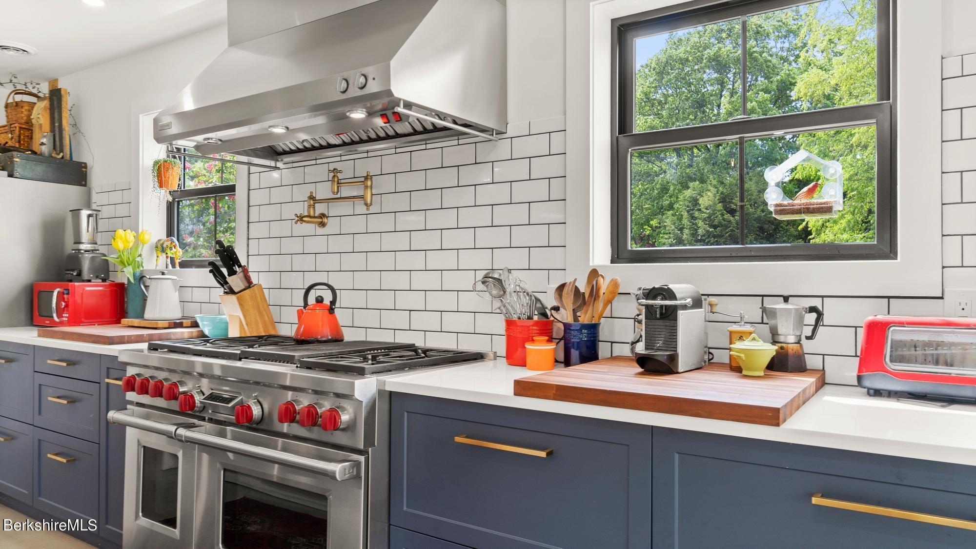 22 B Prospect Hill Road Stockbridge, MA 01262 - Photo 3 of 43 a kitchen with a stove and a sink