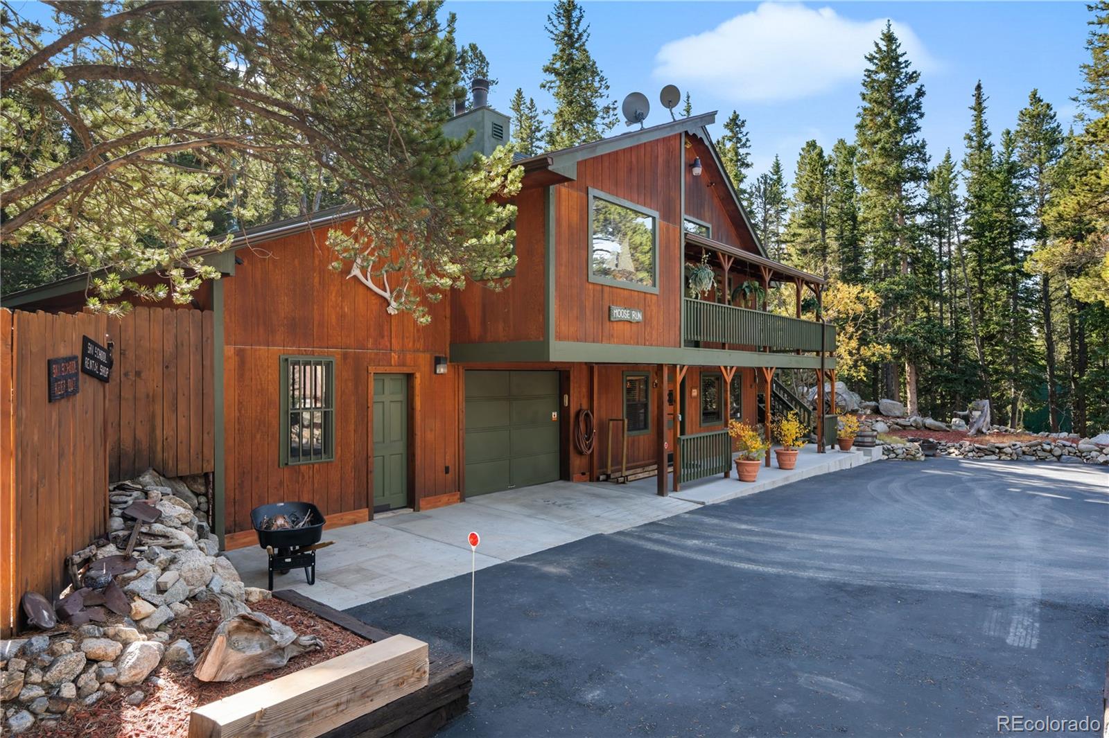 401 Lake Road Idaho Springs, CO 80452 - Photo 2 of 47 a view of a house with roof deck front of house